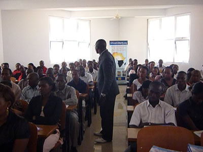 Adedayo demostrating the workings of a free market economy.JPG